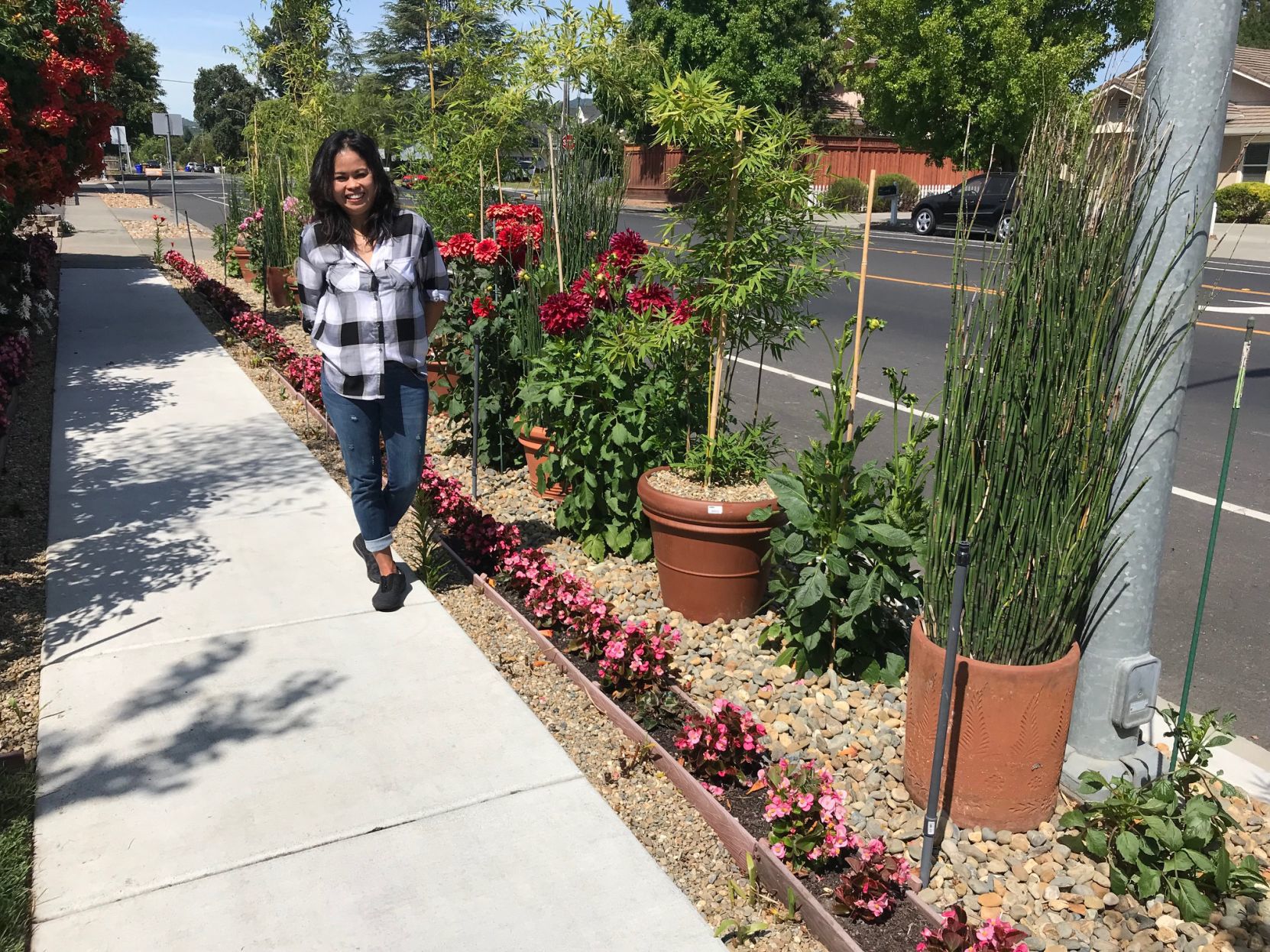 Marcell Gallagher with some of her plants on Trower Avenue.
